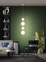 Modern Vertical Glass Globe Pendant Light in Black and Brass Finishes