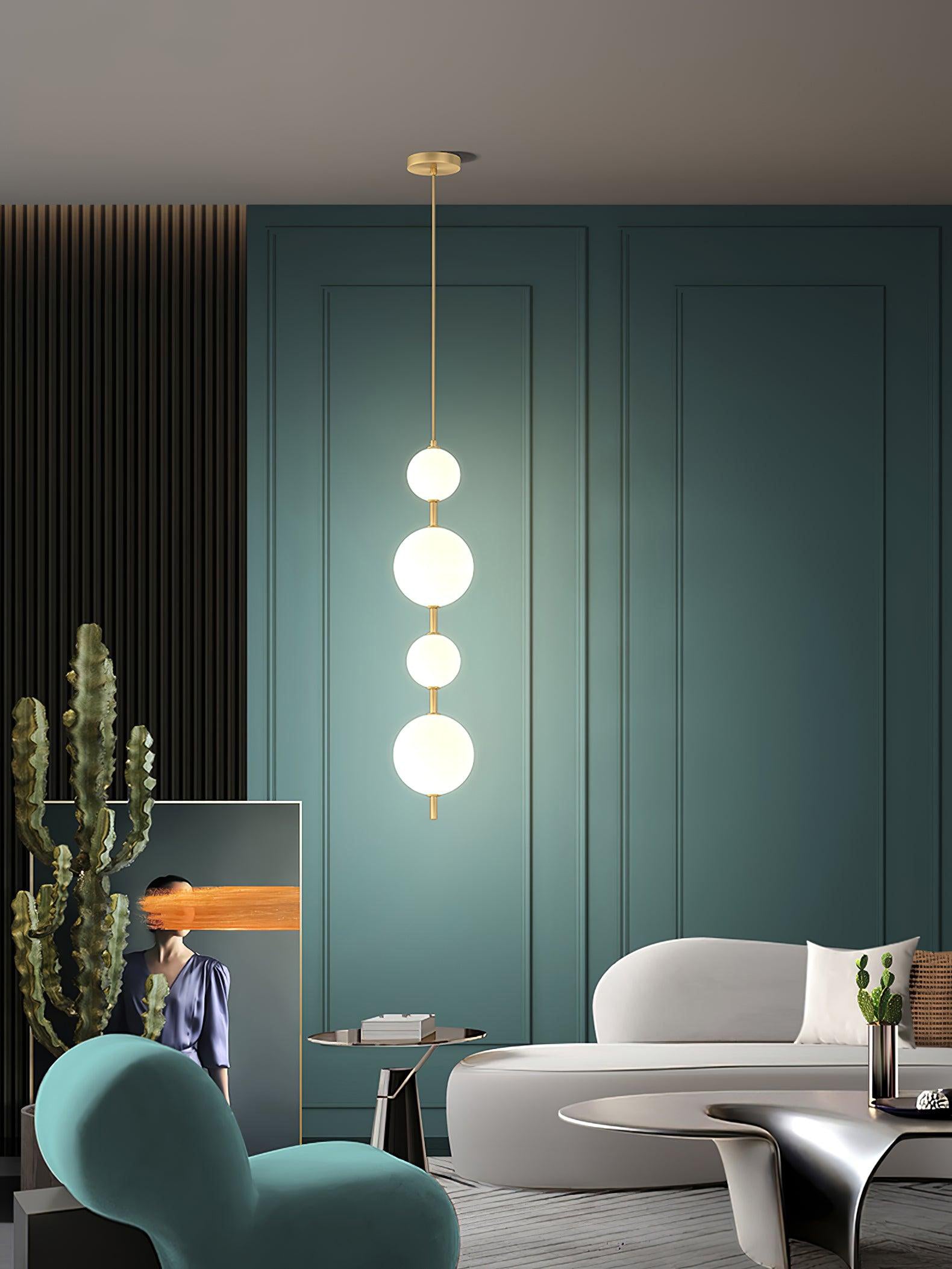 Modern Vertical Glass Globe Pendant Light in Black and Brass Finishes