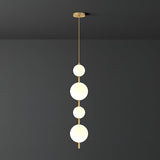 Modern Vertical Glass Globe Pendant Light in Black and Brass Finishes