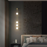 Modern Vertical Glass Globe Wall Sconce Brass LED Bracket Lighting for Interior