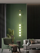 Modern Vertical Glass Globe Wall Sconce Brass LED Bracket Lighting for Interior