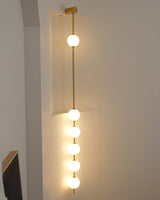 Modern Vertical Glass Globe Wall Sconce Brass LED Bracket Lighting for Interior