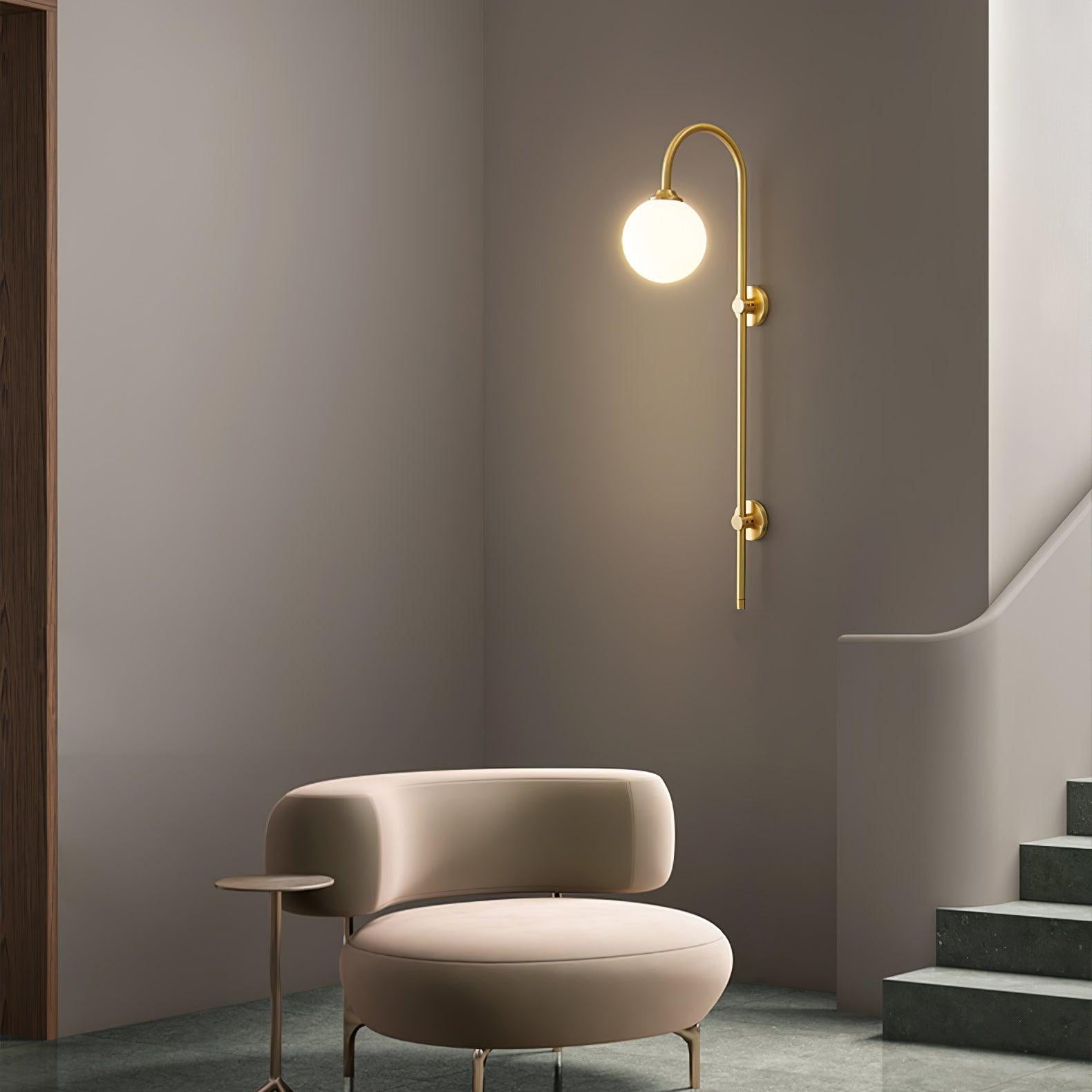 Modern Vertical Gold Wall Sconce with Spherical White Glass Globe Diffuser
