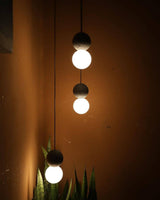 Modern Volcanic Stone and Glass Globe Pendant Light Plug In Swag Lamp