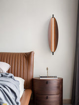 Modern Walnut Wood Grain LED Wall Sconce with Sleek Minimalist Board Design and Warm Lighting