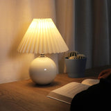 Modern White Ceramic Table Lamp with Pleated Fabric Shade for Bedroom and Living Room