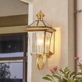 monterey-brass-outdoor-wall-sconce-with-glass-shade-for-exterior-porch-lighting