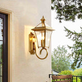 monterey-brass-outdoor-wall-sconce-with-glass-shade-for-exterior-porch-lighting