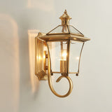 monterey-brass-outdoor-wall-sconce-with-glass-shade-for-exterior-porch-lighting
