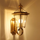 monterey-brass-outdoor-wall-sconce-with-glass-shade-for-exterior-porch-lighting