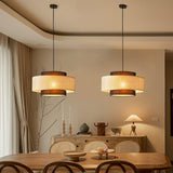 Natural Rattan and Black Linen Dual Layer Drum Pendant Light for Modern Living Spaces