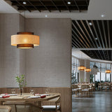 Natural Rattan and Black Linen Dual Layer Drum Pendant Light for Modern Living Spaces