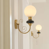 Onyx Modern Glass Globe Wall Sconce with Wood and Metal Accents for Indoor Lighting
