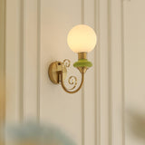 Onyx Modern Glass Globe Wall Sconce with Wood and Metal Accents for Indoor Lighting