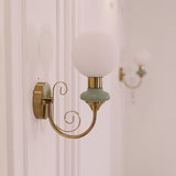 Onyx Modern Glass Globe Wall Sconce with Wood and Metal Accents for Indoor Lighting