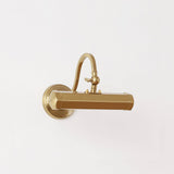 Pacific Modern Adjustable Iron Wall Sconce Elegant Metal Lamp for Indoor Living Spaces