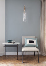 modern-vadim-glass-wall-sconce-with-perforated-metal-cage-and-brass-finish-for-luxury-interiors