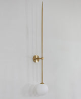 modern-brass-and-opal-glass-sphere-mobile-wall-sconce-lighting-for-indoor-spaces
