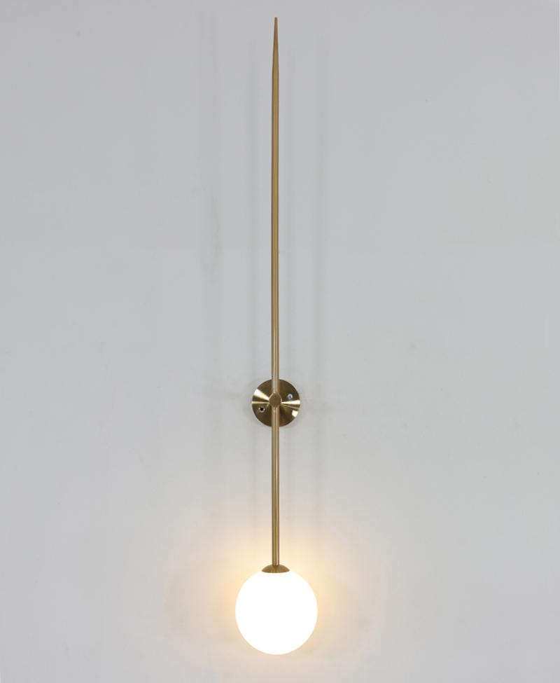 modern-brass-and-opal-glass-sphere-mobile-wall-sconce-lighting-for-indoor-spaces