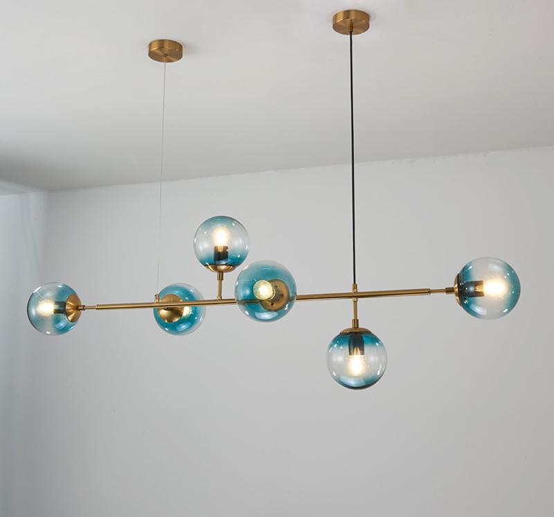 contemporary-multi-glass-globe-pendant-light-with-round-orb-shades-and-polished-brass-frame