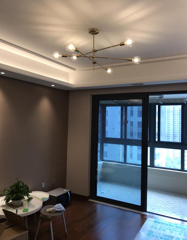 modern-brass-mobile-chandelier-with-adjustable-arms-mid-century-pendant-lighting