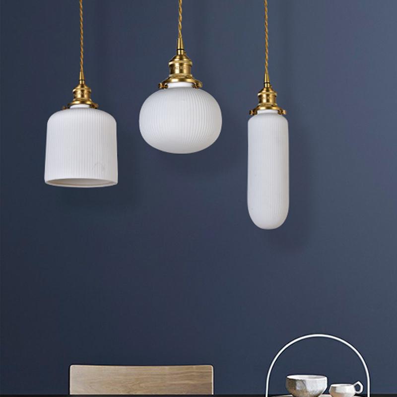 modern-shell-inspired-ceramic-pendant-light-art-deco-porcelain-hanging-lamp-with-brass-accents