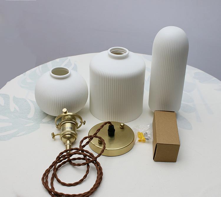 modern-shell-inspired-ceramic-pendant-light-art-deco-porcelain-hanging-lamp-with-brass-accents