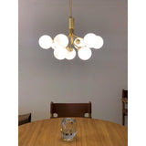 modern-apiales-glass-globe-chandelier-flower-inspired-pendant-light-for-dining-room