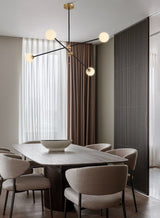 modern-hand-blown-glass-globe-chandelier-with-elegant-brass-and-copper-finishes