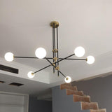 modern-hand-blown-glass-globe-chandelier-with-elegant-brass-and-copper-finishes