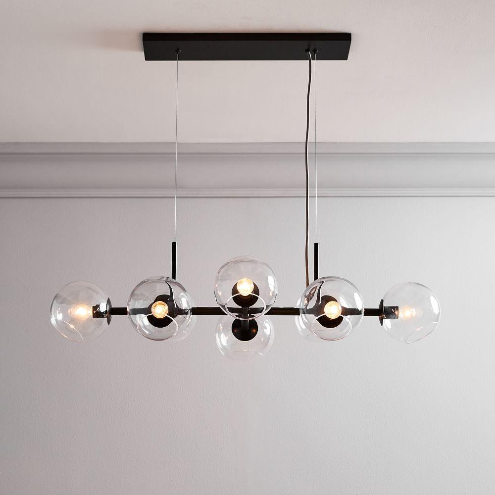 modern-linear-staggered-glass-orb-chandelier-for-dining-room-and-kitchen-island