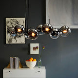 modern-linear-staggered-glass-orb-chandelier-for-dining-room-and-kitchen-island