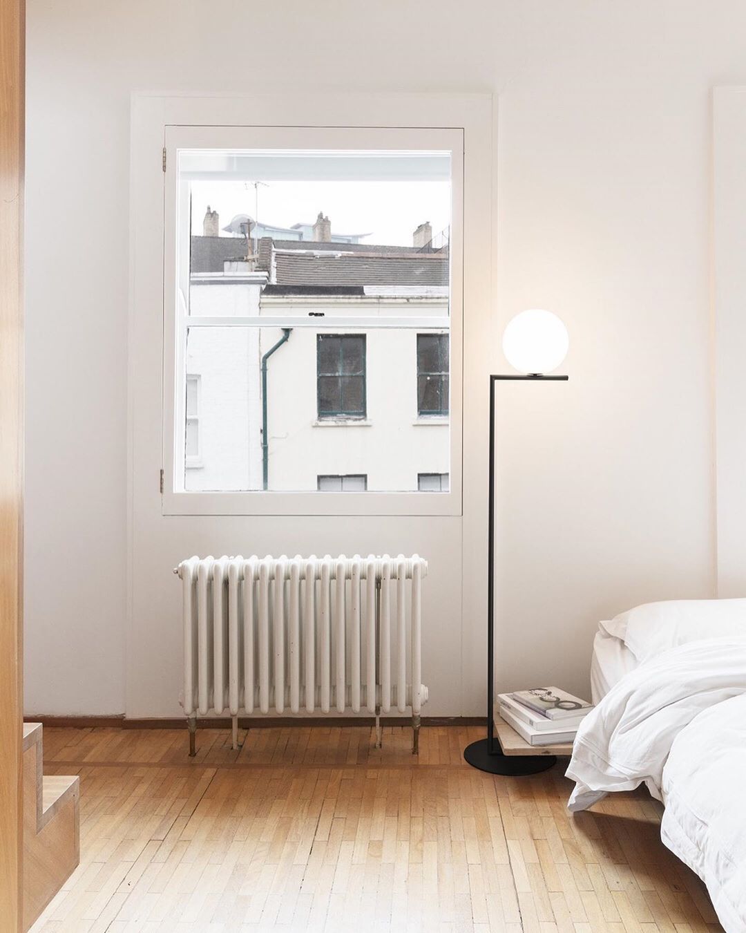 modern-industrial-gold-standing-lamp-with-white-glass-globe-shade-and-foot-switch