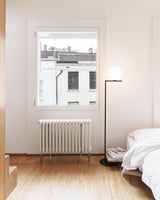 modern-industrial-gold-standing-lamp-with-white-glass-globe-shade-and-foot-switch