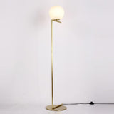 modern-industrial-gold-standing-lamp-with-white-glass-globe-shade-and-foot-switch