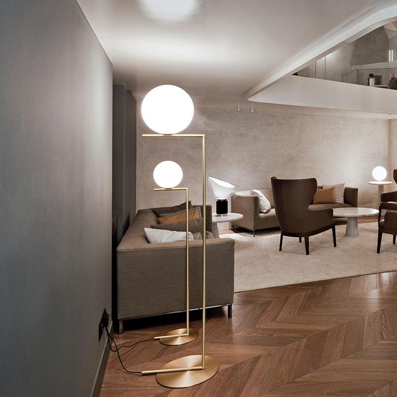 modern-industrial-gold-standing-lamp-with-white-glass-globe-shade-and-foot-switch