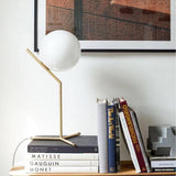 modern-opalescent-blown-glass-globe-table-lamp-with-flexible-steel-base-and-gold-finish