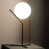 modern-opalescent-blown-glass-globe-table-lamp-with-flexible-steel-base-and-gold-finish