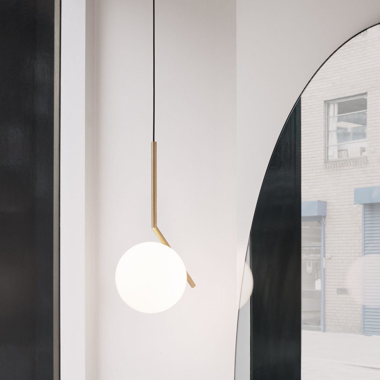 modern-brass-and-opal-glass-globe-pendant-light-minimalist-baton-design-hanging-lamp