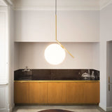 modern-brass-and-opal-glass-globe-pendant-light-minimalist-baton-design-hanging-lamp