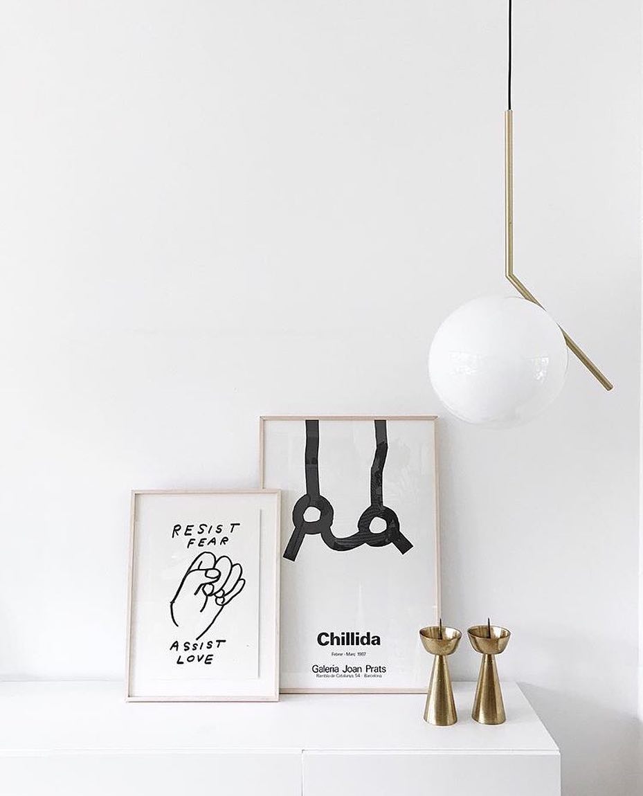 modern-brass-and-opal-glass-globe-pendant-light-minimalist-baton-design-hanging-lamp