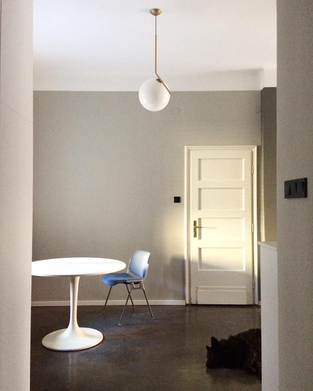 modern-brass-and-opal-glass-globe-pendant-light-minimalist-baton-design-hanging-lamp
