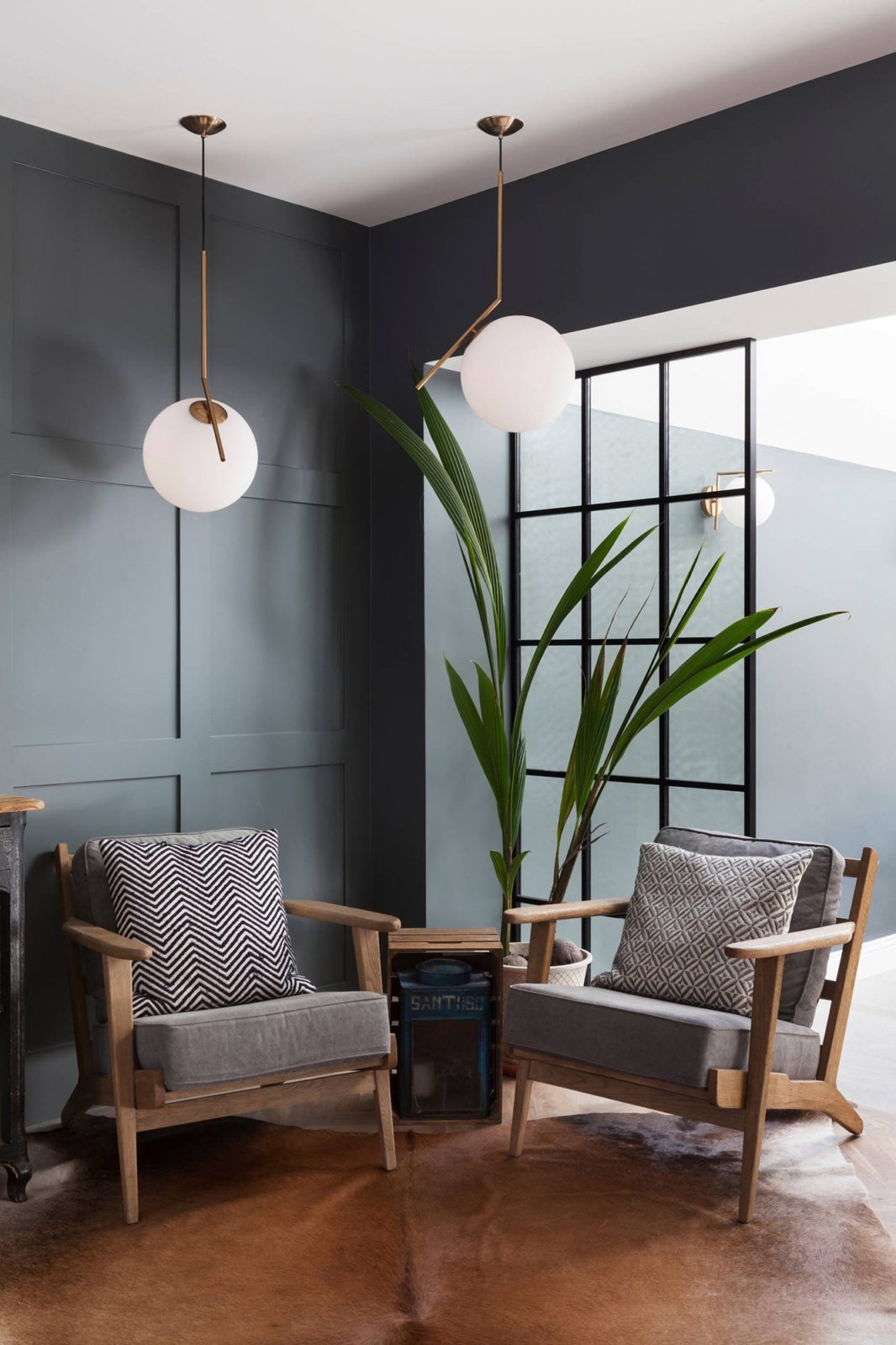 modern-brass-and-opal-glass-globe-pendant-light-minimalist-baton-design-hanging-lamp