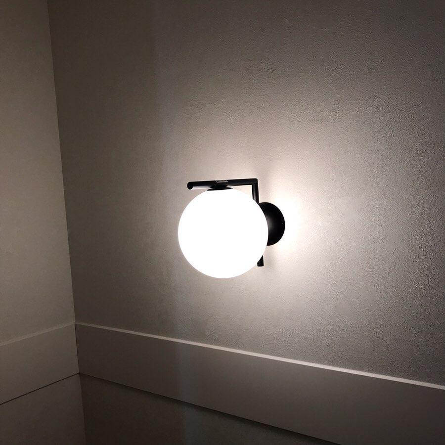 modern-opal-blown-glass-wall-sconce-with-elegant-brass-finish-round-globe-lighting