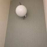 modern-opal-blown-glass-wall-sconce-with-elegant-brass-finish-round-globe-lighting
