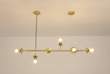 contemporary-multi-glass-globe-pendant-light-with-round-orb-shades-and-polished-brass-frame