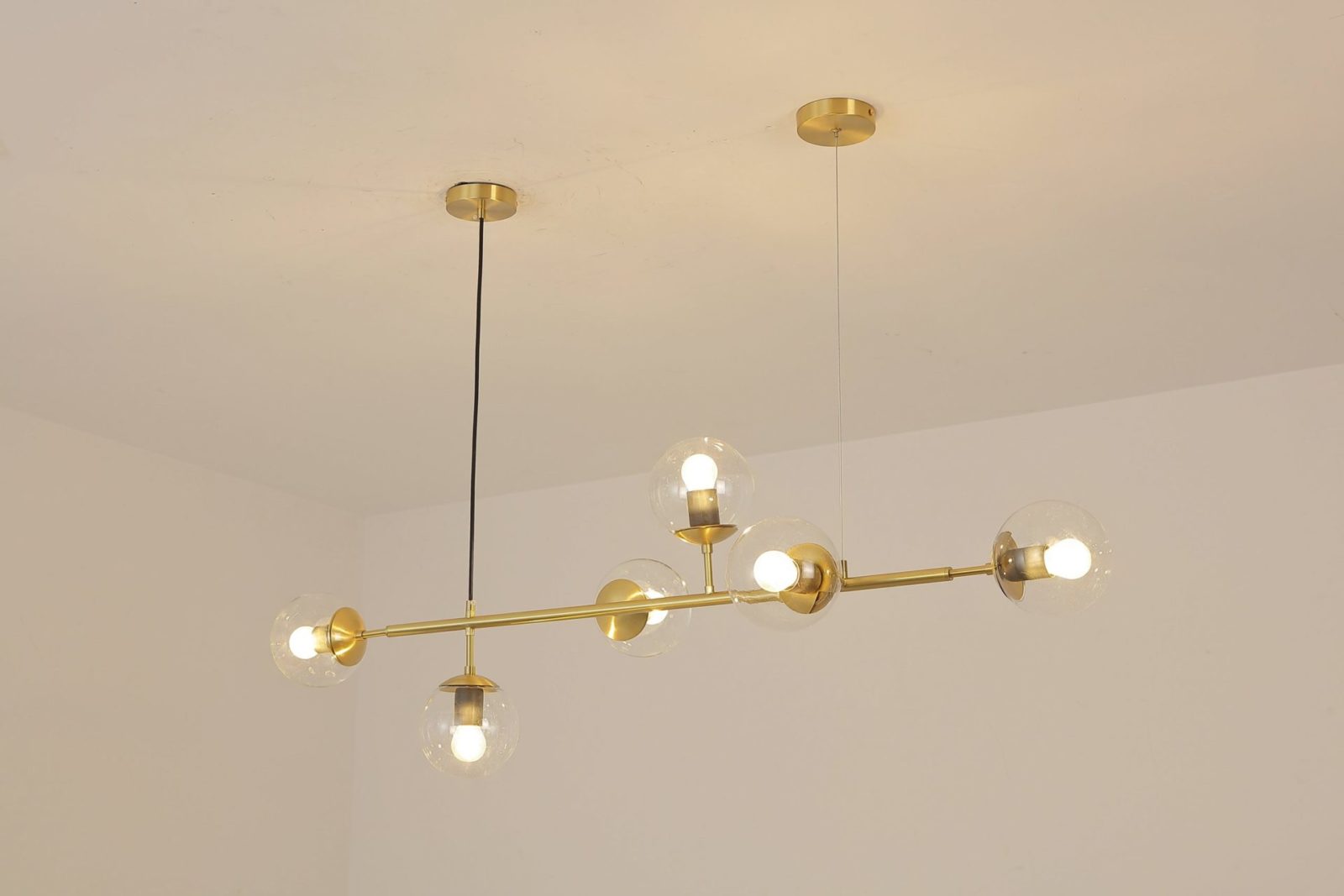 contemporary-multi-glass-globe-pendant-light-with-round-orb-shades-and-polished-brass-frame