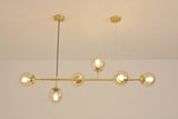 contemporary-multi-glass-globe-pendant-light-with-round-orb-shades-and-polished-brass-frame