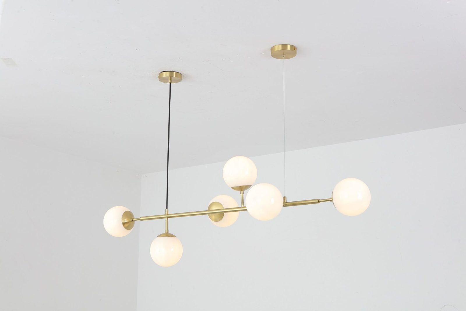 contemporary-multi-glass-globe-pendant-light-with-round-orb-shades-and-polished-brass-frame