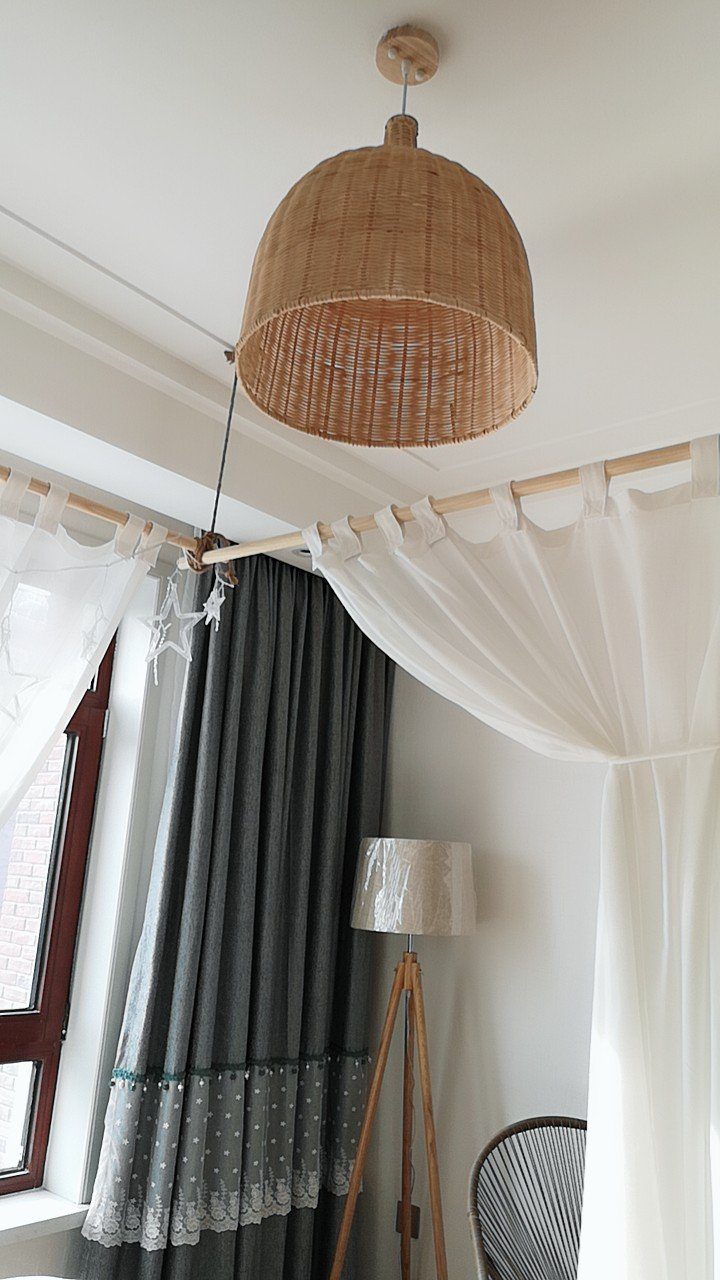 handwoven-natural-rattan-globe-pendant-lamp-for-coastal-and-bohemian-living-spaces